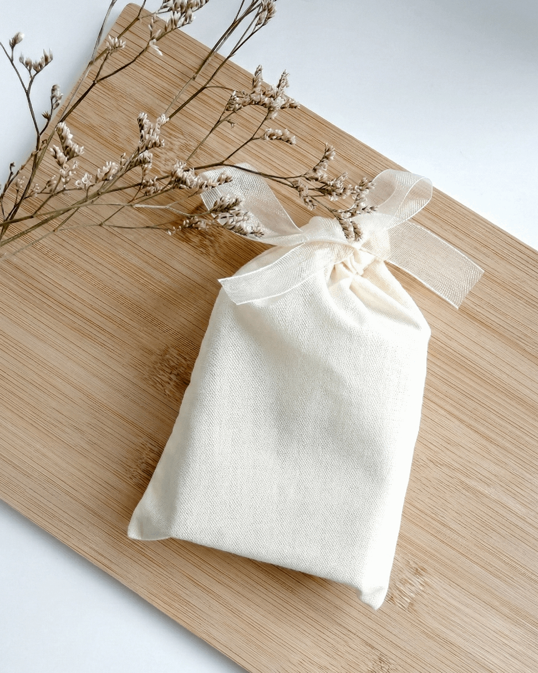 BOLSITA DE ALGODÓN CON LAZO DE ORGANZA